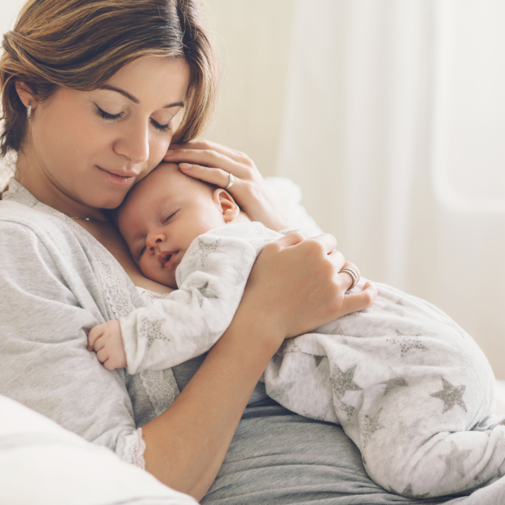 mother with sleeping baby