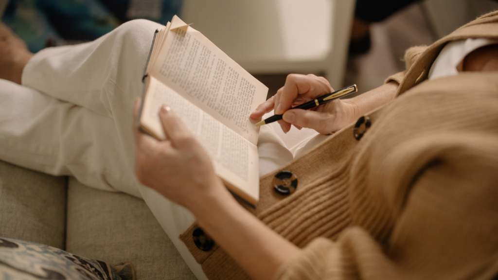 woman reading a book relaxing